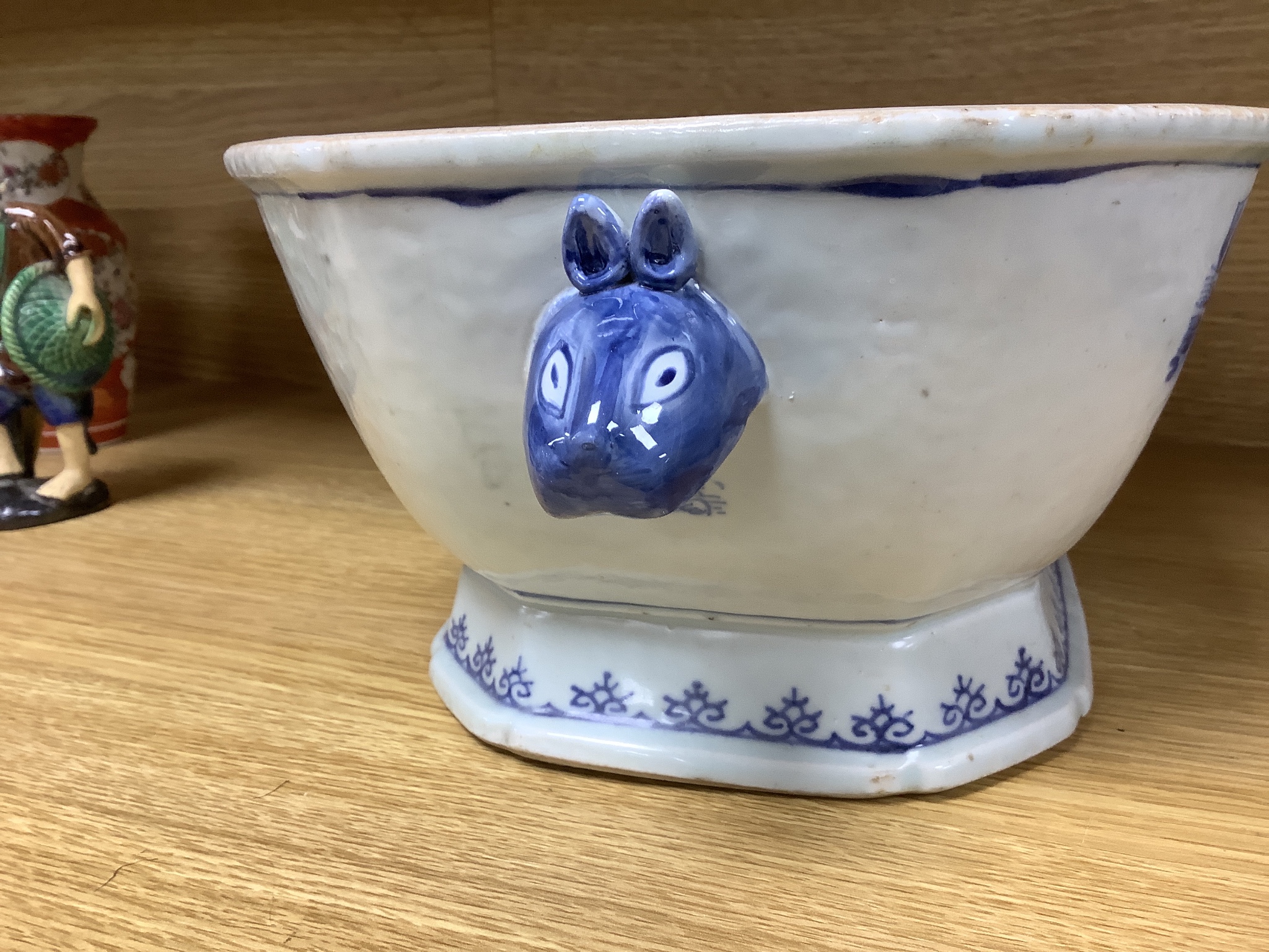 Two 18th century Chinese export blue and white lidded tureens, one lacking cover, 34cm